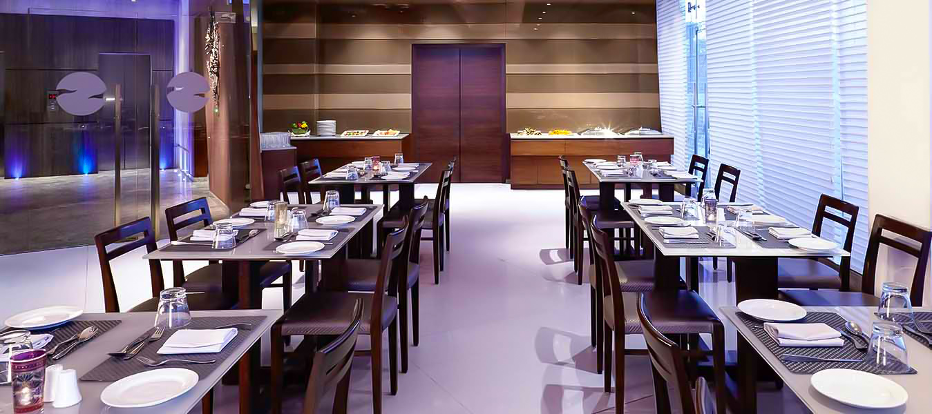 Exceptional Dining: Multi-cuisine restaurant Cinnamon offers diverse culinary delights.